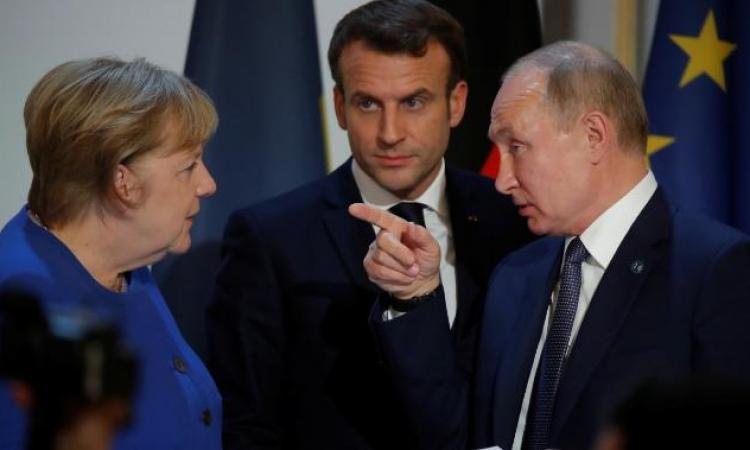 Путин обсудил с Макроном и Меркель ситуацию на востоке Украины